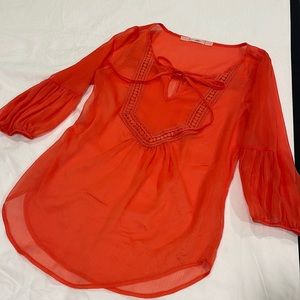 Gibson orange sheer top